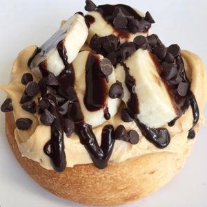 Peanut Butter Frosting with Bananas, Chocolate Chips & Chocolate Sauce! at Cinnaholic in Noblesville