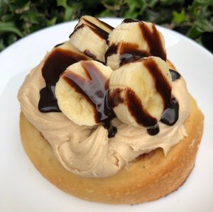 Peanut Butter Frosting, Bananas, and Chocolate Sauce! at Cinnaholic in Edinburg