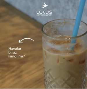 Vegan oat milk ice latte   at Locus Coffee Roastery in Ankara