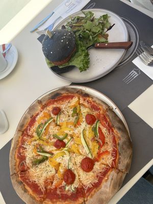 Vegan pizza and veggie burger   at Flora in Oia