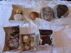 I tried everything! The rustic and carob breads, banana bread, coconut cookies, cinnamon and chocolate rolls, coconut bread (that tasted like a donut), croissant, and cardamom brea at Mr Portuguese Bakery in Faro