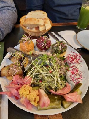 Large mixed starter platter: eggplant rolls, phkali (balls of spinach/beetroot/carrot on cornbread), princess beans, peppers with walnut, seasonal veggies (30€), Attention: by de at SO RE Restaurant & Bar - Georgische Küche in Dusseldorf
