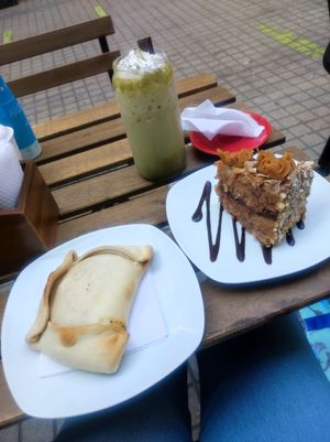 Empanada, matcha latte frío, torta manjar at Happy Vegan Coffee in Santiago