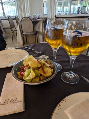 Patatas bravas - potatoes with a squirt of cheap tasting ketchup at Arrocería El Rek in Valencia