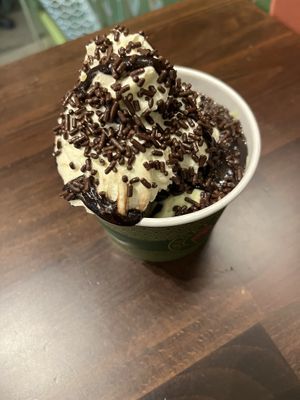 Hard to tell, but underneath that mountain of vegan whipped cream and hot fudge sauce is a generous “single” of matcha mint chip ice cream   at Swanky Scoop in Woodinville