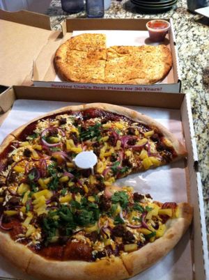 Vegan BBQ pizza with 'beef' and vegan cheese sticks at The Pie in South Jordan