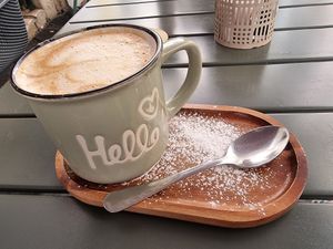 Pistachio oatmilk latte at Quase Café in Lisbon