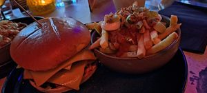 Double burger and fries loaded with katsu sauce and onion at August House in Glasgow