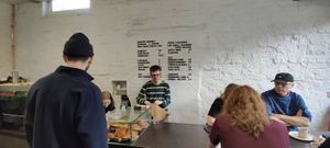 Menu, and serving area. at COFFI in Liverpool