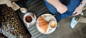 Tea, coffee and vegan croissant. at COFFI in Liverpool