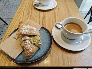 Vegan pistachio cornetto with double espresso at Grey Kaffee in Vienna