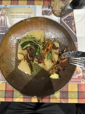 Lithuanian zeppelins or grated potatoe dumplings. Super yummy 🤤.  at Bernelių Užeiga - Gedimino in Vilnius