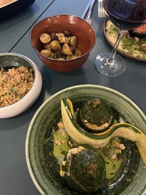 Main and sides (stuffed courgette, bulgar salad and roasted potatoes and mushrooms)  at HEBE  in Paris