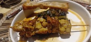 Tempeh di ceci con inzimino e focaccia toscana  at il Brucaliffo Cucina in Castiglione Dorcia