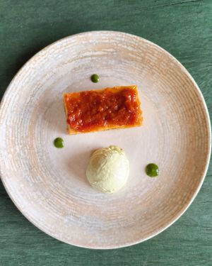 Coconut and apricots cake, with and homemade basil lemon and ginger icecream at il Brucaliffo Cucina in Castiglione Dorcia