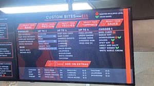 Menu with vegan call outs  at The Mongolorian BBQ in Orlando