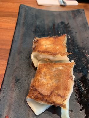Impossible Gyoza apps were so juicy & flavorful. Every table is equipped with gyoza sauce, seasoning sauce & spice paste, to make your own special dipping sauce.  at JINYA Ramen Bar - 2nd and PCH in Long Beach