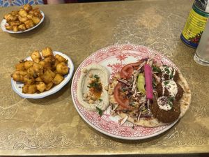 Falafel open wrap platter with batata harra   at Comptoir Libanais in Ellesmere Port