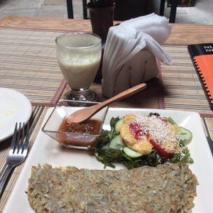 Omelete made with potatoes and cheese, And piña lassi. at Centro Bharati in Guanajuato