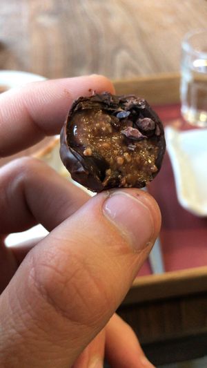 inside of one of the pieces, a delicious creamy walnut filling  at Laurent Gerbaud Chocolatier in Brussels