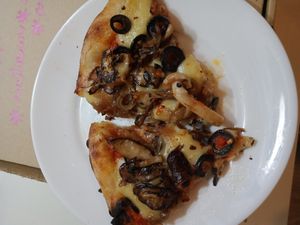 We added mushroom and olives to the margarita pizza, amazing! at Vegan House - Bukit Damansara in Kuala Lumpur