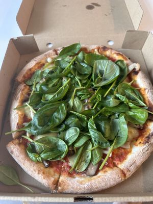 Outstanding pizza 🍕- magharita with raw spinach and two kinds of mushrooms   at Vegan House - Bukit Damansara in Kuala Lumpur