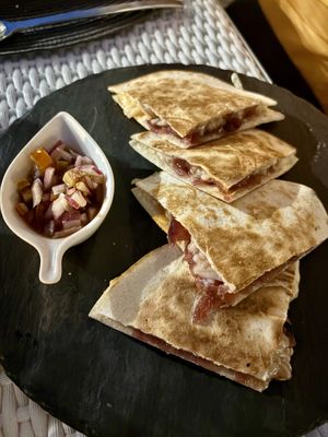 Red onion and vegan cheese quesadillas  at Cava in Teulada