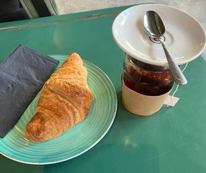 Vegan croissant and wild berries tea  at A Little Lost in Munich
