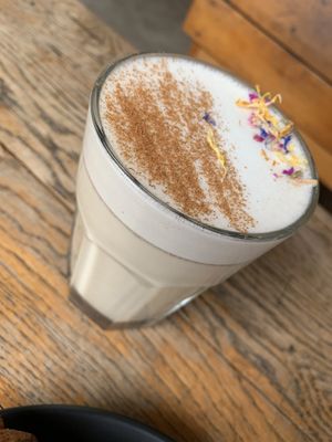 Very pretty chai with oat milk 💚  at A Little Lost in Munich