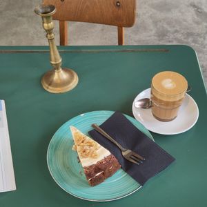 Flat white and carrot cake at A Little Lost in Munich