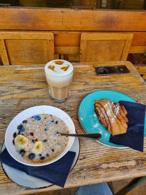 Granola with soy milk, danish and a latte at A Little Lost in Munich