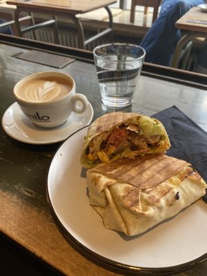 Vegan burrito and cappuccino. 5/5! 💚🌱  at A Little Lost in Munich