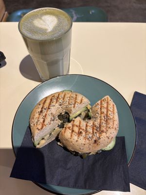 Hummus bagel and matcha latte  at A Little Lost in Munich