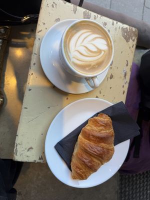 Cappuccino and croissant  at A Little Lost in Munich