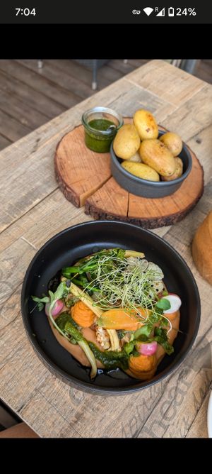 Roasted cauliflower with bean puree and new potatoes with fresh vegan pesto. at Hea Maa in Parnu
