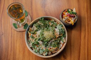 Chilaquiles rojos hechos 100 en casa, con té natural y fruta fresca de temporada at Aguacate Veggie Bar in Oaxaca