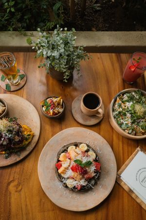 OPCIONES PARA DESAYUNAR: waffle de avena y plátano, chilaquiles rojos, omellete de espinacas at Aguacate Veggie Bar in Oaxaca