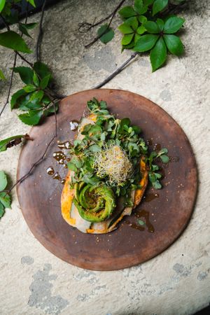 AVOCADO TOAST WITH CARROT HUMMUS at Aguacate Veggie Bar in Oaxaca