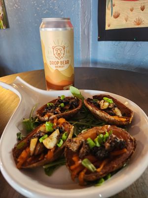 Vegan potato skins with vegan cheese and mushrooms at Drop Bear Brewery in Eugene