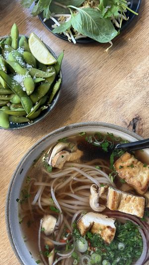 vegan pho with plenty of fresh herbs and edamame with lime and sea salt💗 at Mr Pho in Copenhagen
