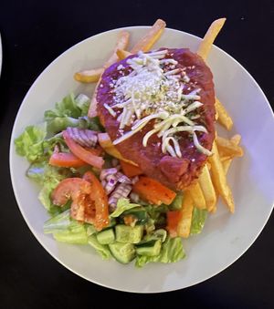Chiken parmigiana with chips & salad  at Mama B's in Chippendale
