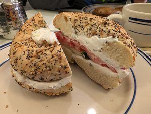 Everything bagel with scallion cream cheese, tomato, cucumber at Baz Bagel in New York City