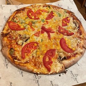 Large pizza with vegan cheese tomato, corn, paprika, mushrooms at Pizzeria MamaRosa in Kos