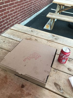 Cute personal pizza box  at Josies Pizza Bar in Glen Cove