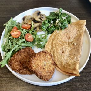 Chickpea omelette with hash browns   at Plantoholic in Dubai