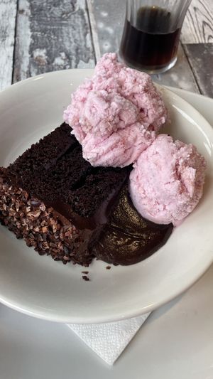 Chocolate fudge cake with strawberry ice cream.   at Old World Tea Rooms in Ventnor