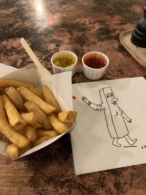 Chips, piccalilli and ketchup  at Frites Atelier in Brussels