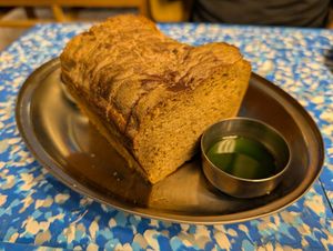 Lithuanian bread and basil oil at bar mir in Warsaw