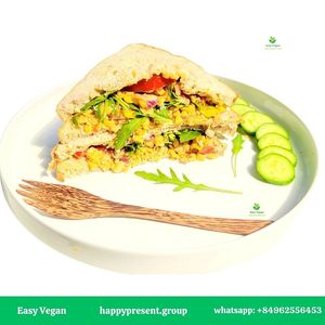 SERENITY SEED 
Sandwich, Organic Chickpeas, Vegan Mayonnaise, Bell Peppers, Onions, Other Local Seasonal Vegetables & Herbs, Spices. at Easy Vegan in Hoi An