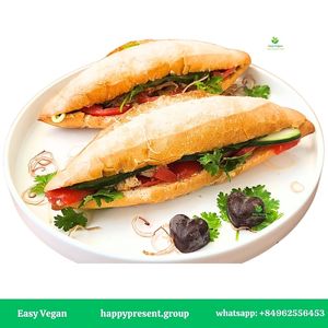 VIETNAM BRILLIANT SHINE 
Vietnamese Bread, Wood-Ear Mushroom, Local Seasonal Vegetables, Vegan Baloney, Vegan Sauces, Vietnamese Herbs, Peanuts,  Other Spices. at Easy Vegan in Hoi An